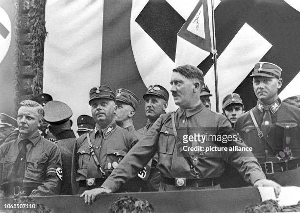 Josef Wagner, Wilhelm Schepmann, Adolf Hitler and chief of staff Victor Lutze during a rally in Dortmund in 1933. | usage worldwide