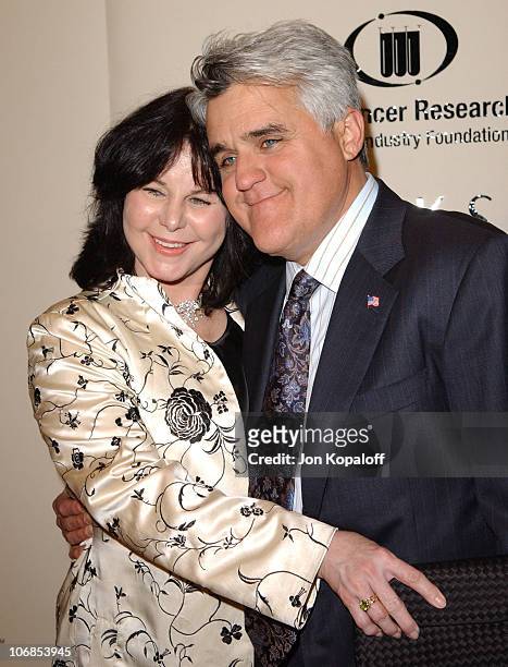 Jay Leno and wife during Saks Fifth Avenue's Unforgettable Evening Benefiting Women's Cancer Research Fund - Arrivals at The Regent Beverly Wilshire...