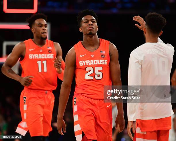 Oshae Brissett and teammate Tyus Battle of the Syracuse Orange react after the conclusion of the first half of the game against Oregon Ducks during...
