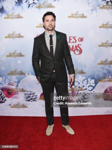 Actor Brett Dalton arrives at the Hallmark Channel "Once Upon A Christmas Miracle" screening and holiday party at 189 by Dominique Ansel on December...