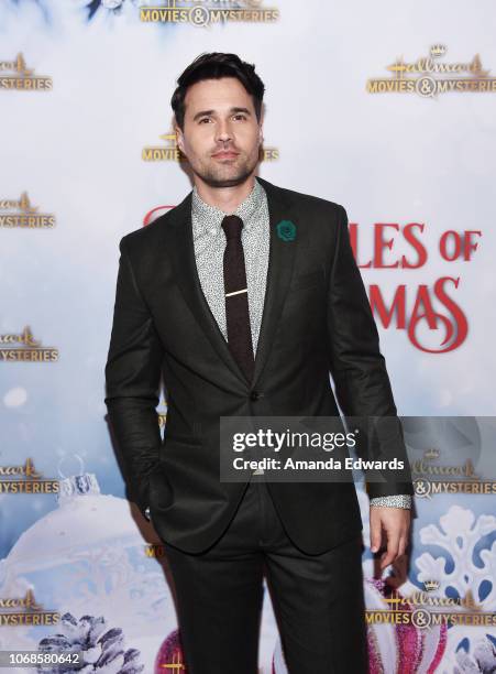 Actor Brett Dalton arrives at the Hallmark Channel "Once Upon A Christmas Miracle" screening and holiday party at 189 by Dominique Ansel on December...