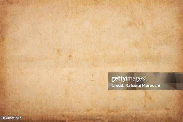 old brown paper texture background - old paper stock-fotos und bilder