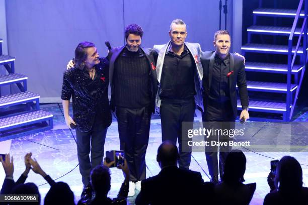 Mark Owen, Howard Donald, Robbie Williams and Gary Barlow of Take That perform at the Opening Night Gala of "The Band" to benefit the Elton John AIDS...