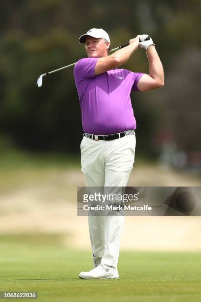Marcus Fraser of Australia plays his approach shot on the 3rd hole during day three of the 2018 Australian Golf Open at The Lakes Golf Club on...