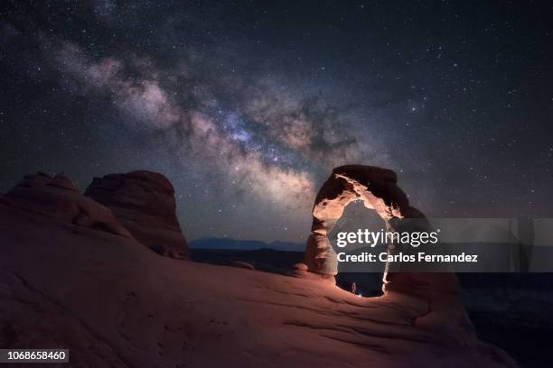 delicate milky way - utah arch stock pictures, royalty-free photos & images