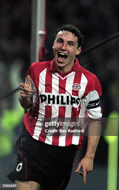 Mark Van Bommel of PSV Eindhoven celebrates scoring during the UEFA Champions League Group G match against Manchester United played at the Philips...