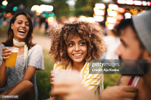 friends having fun at concert. - outdoor concert stock pictures, royalty-free photos & images