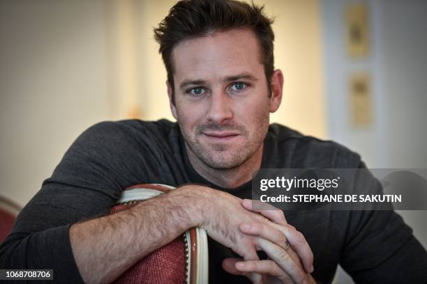 Actor Armie Hammer poses on December 4, 2018 at the Bristol palace hotel in Paris.