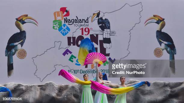 Artist from Korea performs a dance on the fifth day of the Hornbill festival at Kisama Village, some 10 kms away from Kohima, the capital city of...