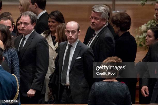 President Donald Trump's White House Senior Adviser Stephen Miller, center, and White House deputy chief of staff for communications Bill Shine,...