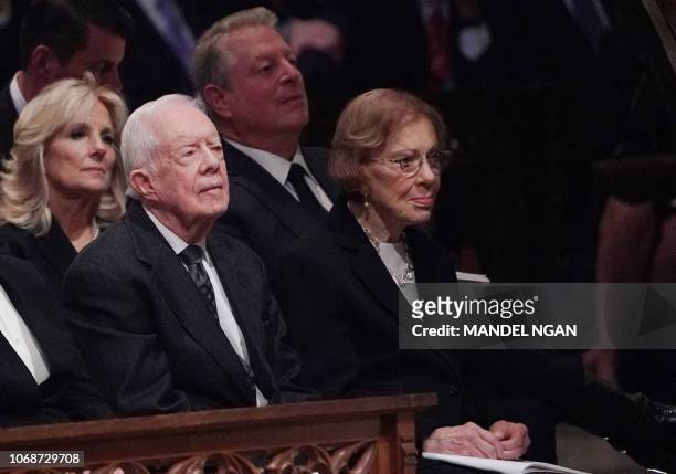 Former US President Jimmy Carter and former US First Lady Rosalynn Carter attend the funeral service for former US president George H. W. Bush at the...
