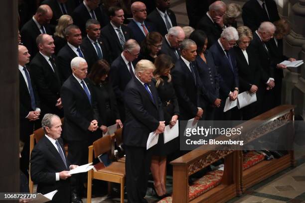 Former U.S. President George W. Bush, first row from left, U.S. President Donald Trump, U.S. First Lady Melania Trump, former U.S. President Barack...
