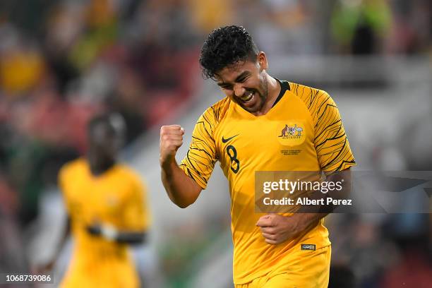 Massimo Luongo of Australia celebrates scoring his teams first goal during the International Friendly match between the Australian Socceroos and...