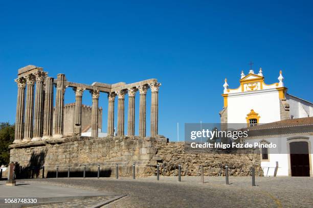 the roman temple of évora, evora district, alentejo, portugal. - evora stock pictures, royalty-free photos & images