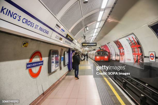 Train seen at the underground station. King's Cross St Pancras tube station in London is an underground station for the subway in Central London...