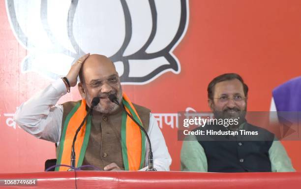 President Amit Shah and Union HRD Minister Prakash Javadekar address the media ahead of the Rajasthan State Assembly elections, at BJP's media...