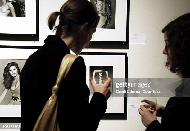 Patrons look at the Work Of Francesco Scavullo during Sotheby's Hosts FRANCESCO SCAVULLO: A Photographic Retrospective and Auction to Benefit...