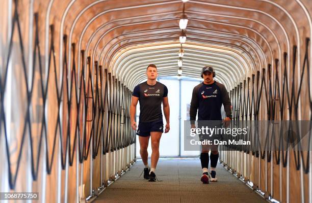 Jack Dempsey and Pete Samu of Australia walk through the tunnel to the pitch prior to the international friendly between Italy and Australia at...