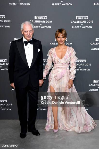 Halle Berry and Marco Tronchetti Provera walk the red carpet ahead of the 2019 Pirelli Calendar launch gala at HangarBicocca on December 5, 2018 in...