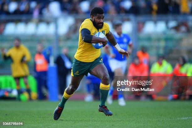 Marika Koroibete of Australia breaks clear to score their first try during the international friendly between Italy and Australia at Stadio Euganeo...