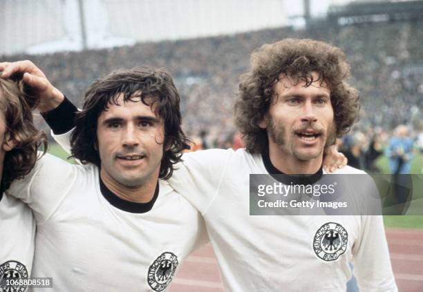 Gerd Müller and Paul Breitner celebrate after West Germany's 2-1 victory over Holland in the 1974 FIFA World Cup Final at the Olympic Stadium on July...