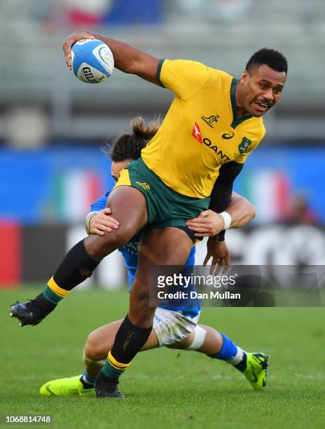Samu Kerevi of Australia is tackled by Michele Campagnaro of Italy during the international friendly between Italy and Australia at Stadio Euganeo on...