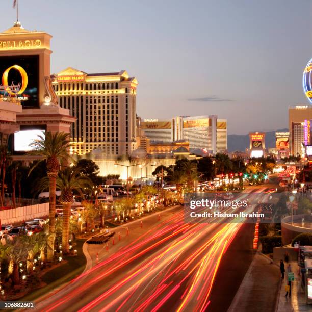 las vegas strip with illuminated hotels / traffic - the mirage las vegas stock pictures, royalty-free photos & images