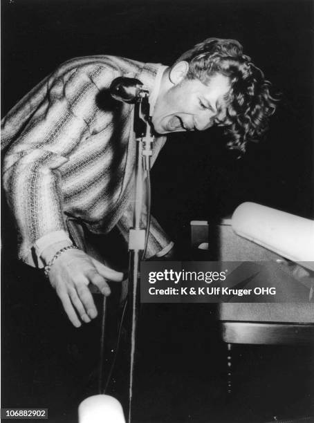 Jerry Lee Lewis performs on stage in the 1950s in Germany.