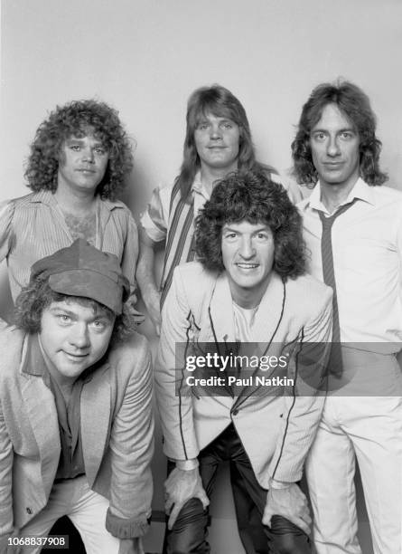 Portrait of REO Speedwagon, clockwise from lower left, Neal Doughty, Gary Richrath , Bruce Hall, Alan Gratzer, and Kevin Cronin at the International...