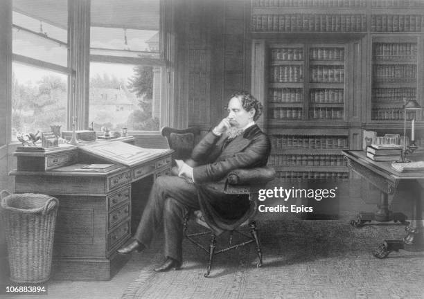 British novelist Charles Dickens sat in his study in Gads Hill near Rochester, Kent circa 1860