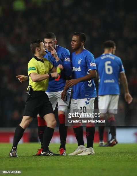 Kyle Lafferty of Rangers remonstrates with referee Steven McLean after Alfredo Morelos of Rangers lis given a second yellow card during the Scottish...