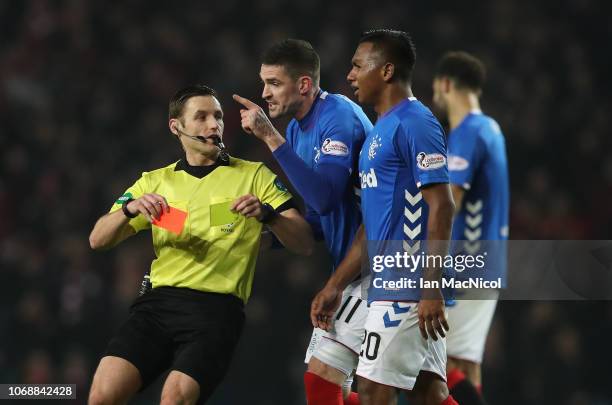 Kyle Lafferty of Rangers remonstrates with referee Steven McLean after Alfredo Morelos of Rangers lis given a second yellow card during the Scottish...