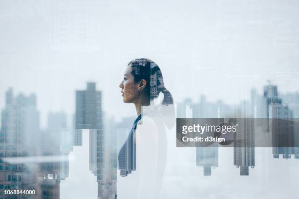 double exposure of confidence young asian woman over cityscape - multiple exposure stock pictures, royalty-free photos & images
