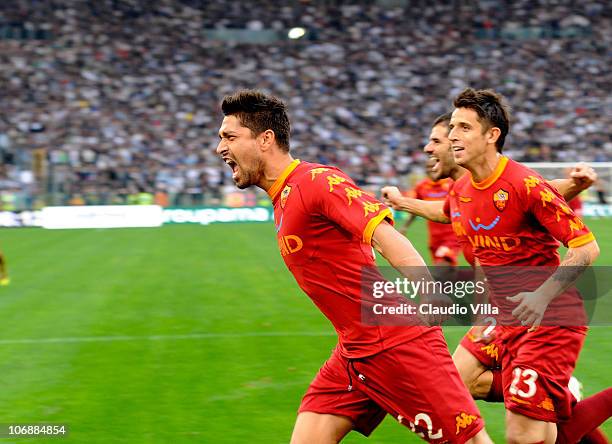 Marco Borriello of AS Roma celebrates scoring the first goal during the Serie A match between Lazio and Roma at Stadio Olimpico on November 7, 2010...