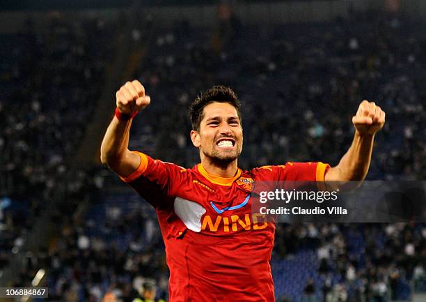 Marco Borriello of AS Roma celebrates scoring the first goal during the Serie A match between Lazio and Roma at Stadio Olimpico on November 7, 2010...