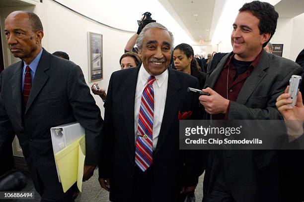 Rep. Charlie Rangel is pursued by reporters and photographers after unexpectedly leaving his House of Representatives ethics committee hearing in the...