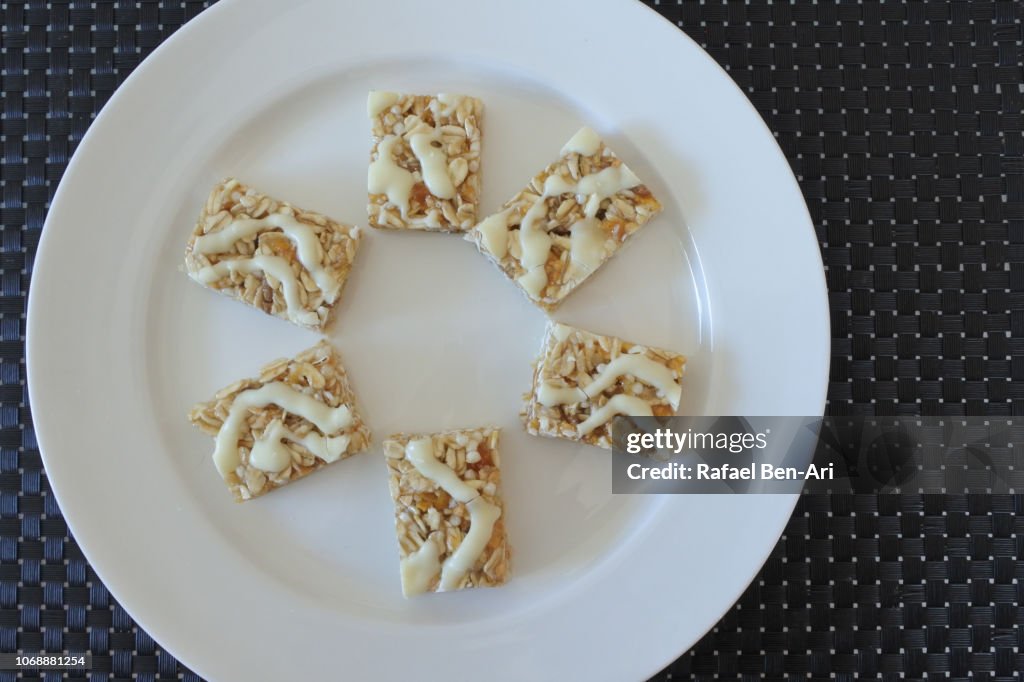 Muesli Bar Slices Served on a Round White Bawl