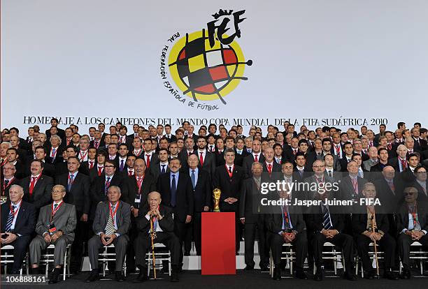 President Sepp Blatter and the President of the Spanish Football Federation Angel Maria Villar stand with current and former Spanish football players...