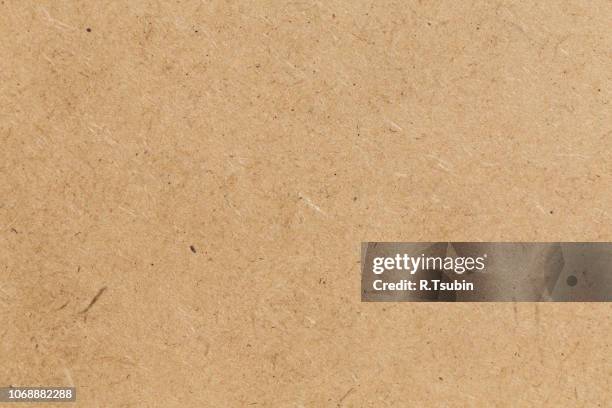 pressed beige chipboard texture. wooden background - recycled paper stock pictures, royalty-free photos & images