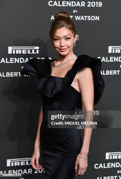 Model Gigi Hadid poses on the red carpet ahead of the 2019 Pirelli Calendar launch gala at the Pirelli HangarBicocca on December 5, 2018 in Milan. -...