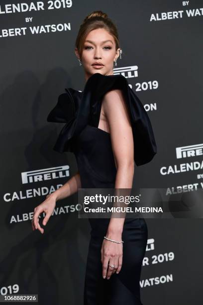 Model Gigi Hadid poses on the red carpet ahead of the 2019 Pirelli Calendar launch gala at the Pirelli HangarBicocca on December 5, 2018 in Milan. -...