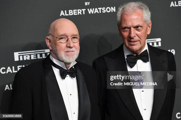 Scottish photographer Albert Watson and Pirelli's CEO Marco Tronchetti Provera pose on the red carpet upon their arrival at the 2019 Pirelli Calendar...