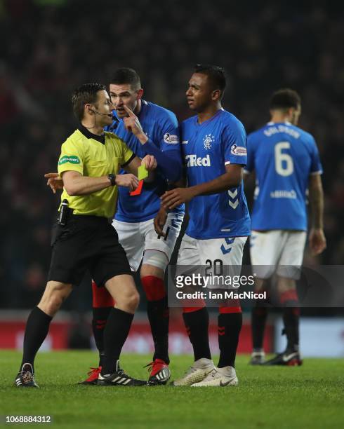 Kyle Lafferty of Rangers remonstrates with referee Steven McLean after Alfredo Morelos of Rangers lis given a second yellow card during the Scottish...