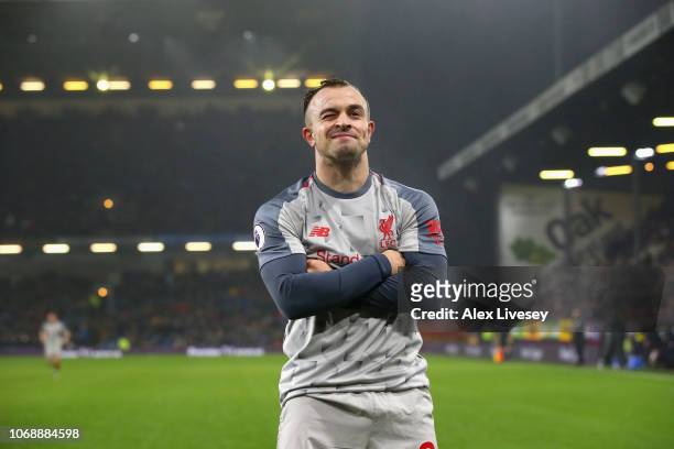 Xherdan Shaqiri of Liverpool celebrates after scoring his team's third goal during the Premier League match between Burnley FC and Liverpool FC at...