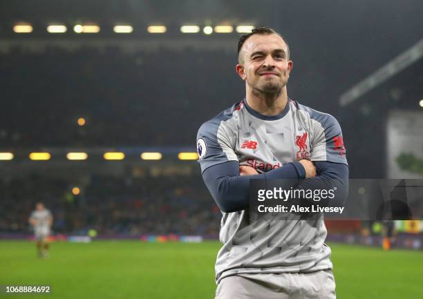 Xherdan Shaqiri of Liverpool celebrates after scoring his team's third goal during the Premier League match between Burnley FC and Liverpool FC at...