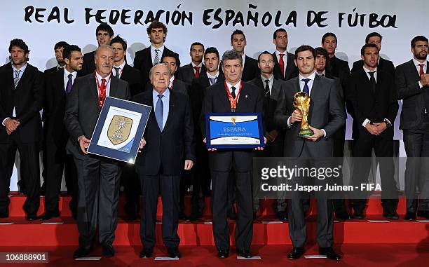 President Sepp Blatter stands with the Spanish Head coach Vicente del Bosque , the President of the Spanish Football Federation Angel Maria Villar...