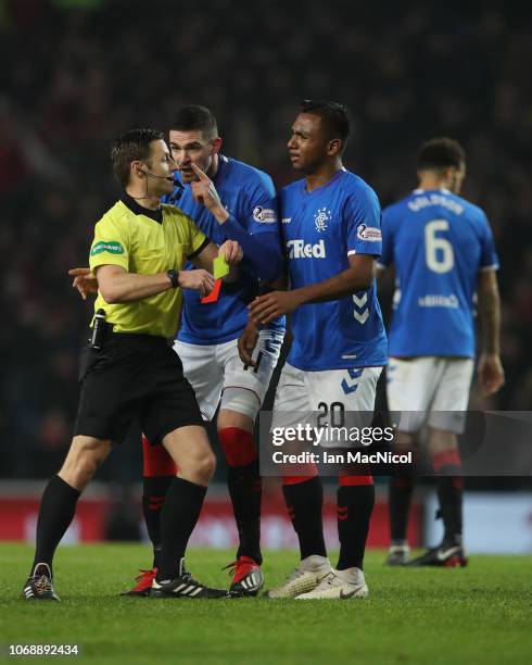 Kyle Lafferty of Rangers remonstrates with referee Steven McLean after Alfredo Morelos of Rangers lis given a second yellow card during the Scottish...