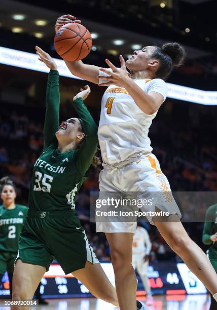 Tennessee Lady Volunteers forward Mimi Collins grabs a rebound over Stetson Hatters forward Kendall Lentz during a college basketball game between...