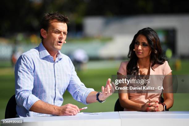 Adam Gilchrist and Isa Tara Guha commentate during day one of the First Test match in the series between Australia and India at Adelaide Oval on...