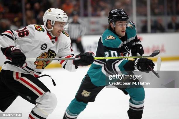 Pontus Aberg of the Anaheim Ducks pushes past Marcus Kruger of the Chicago Blackhawks uring the first period of a game at Honda Center on December 5,...